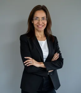 Professional woman in glasses with folded arms