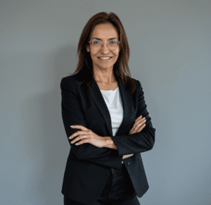 Businesswoman wearing glasses smiling at camera